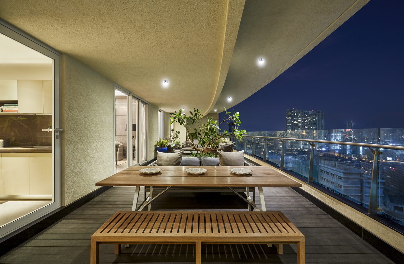 Sky residence balcony overlooking the city at night